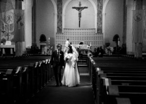 Bride and Groom walking out of Church