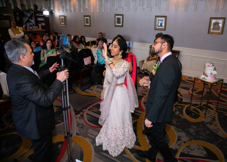 Young Indian Wedding Couple in a Zoom meeting.