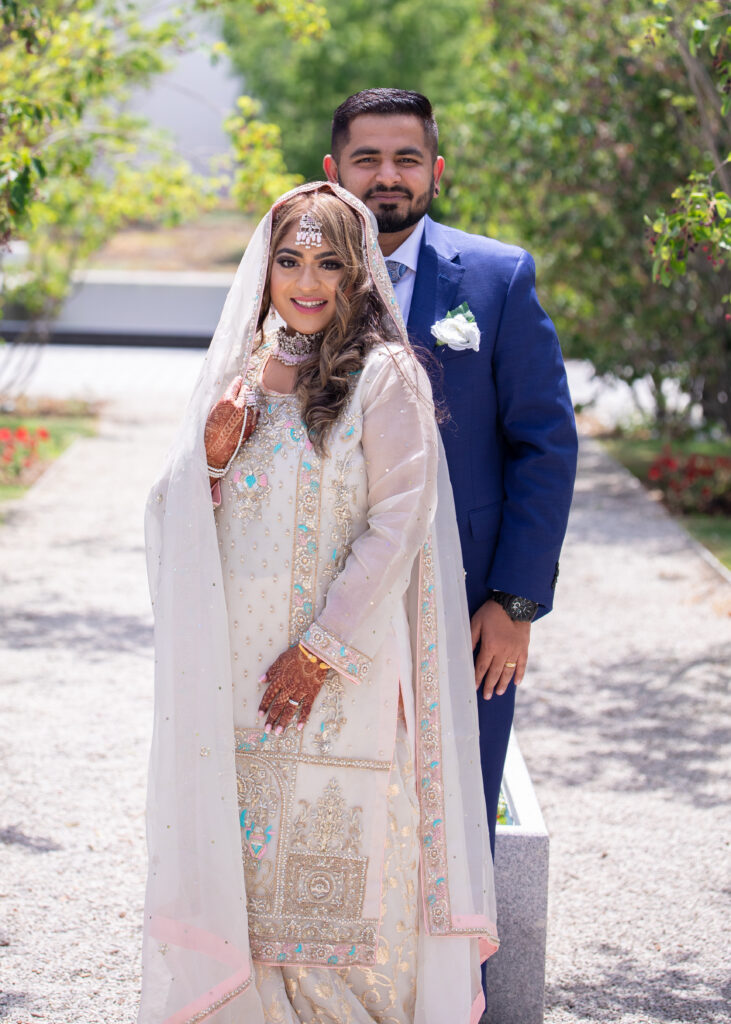 Aga Khan Muslim Wedding Image. Bride And Groom. Exterior Image.