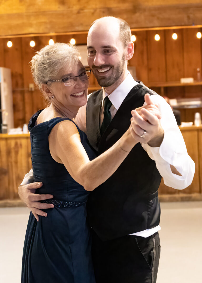 Wedding season. Groom dances with his Mother.