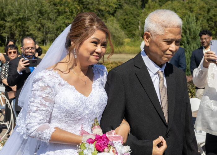 Filipino Bride and Father walk towards the Alter.