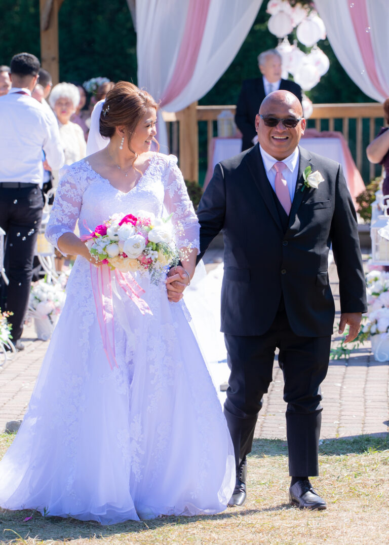 Wedding Photography Peterborough. Bride and Groom leave the Church service.