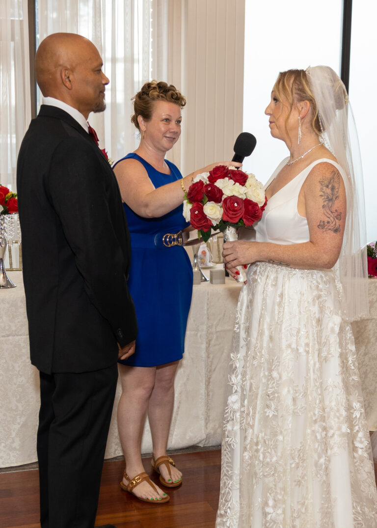 Wedding Photography Toronto. Bride speaks her vows.