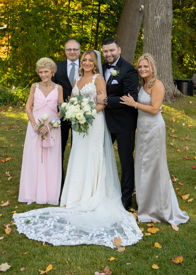 Wedding Photography Toronto. Bride and Groom with Family image.