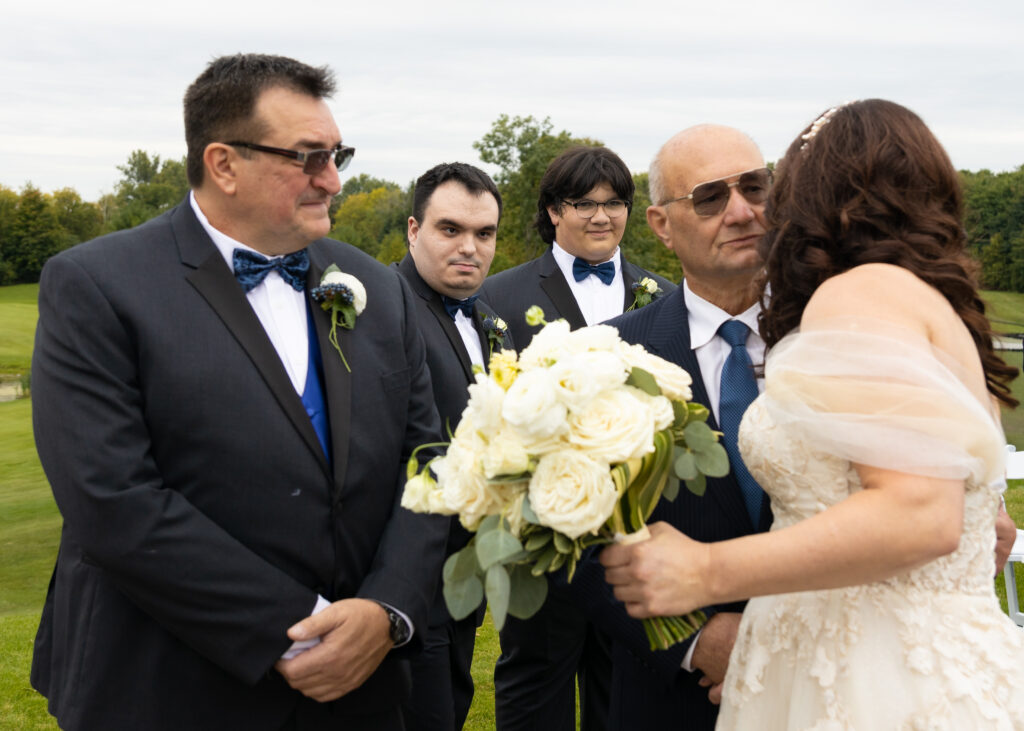 Wedding Photos. Father of the Bride gives away his Daughter.