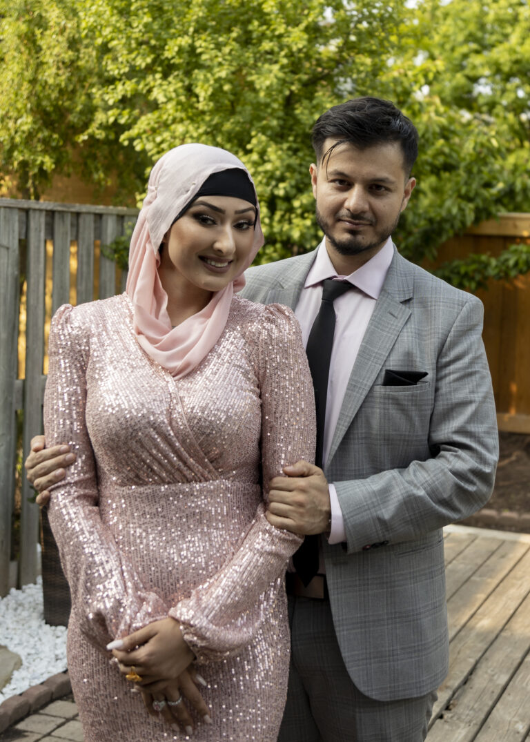 Pakistani Wedding Photography. Happy Bride and Groom image.