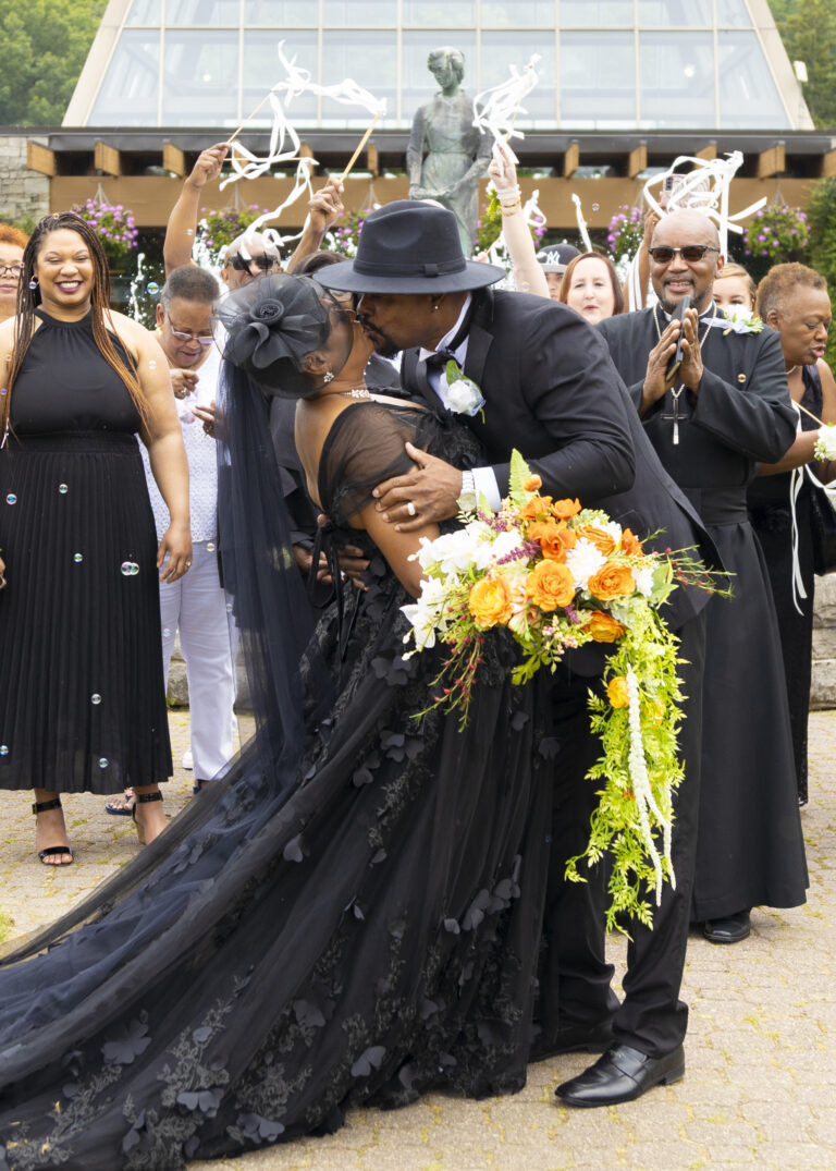Niagara Falls Wedding. Black Couple first kiss.