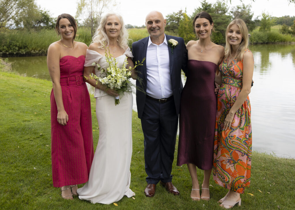 Wedding photography image of a Bride, Groom and family.