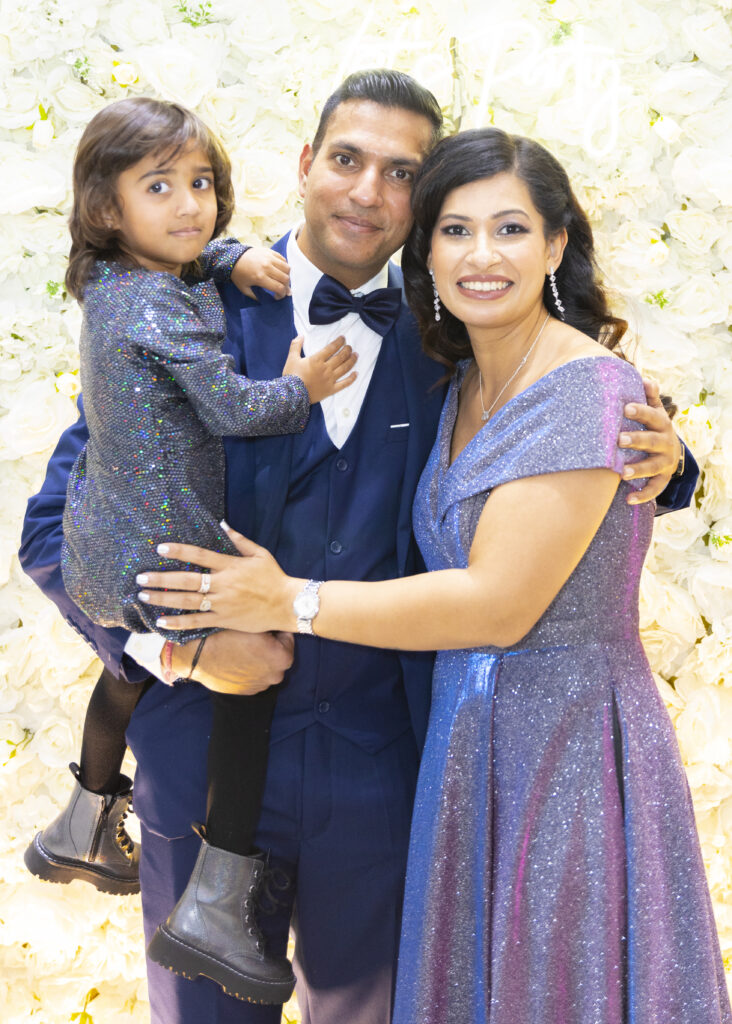 Indian Wedding Couple with Child in arms.